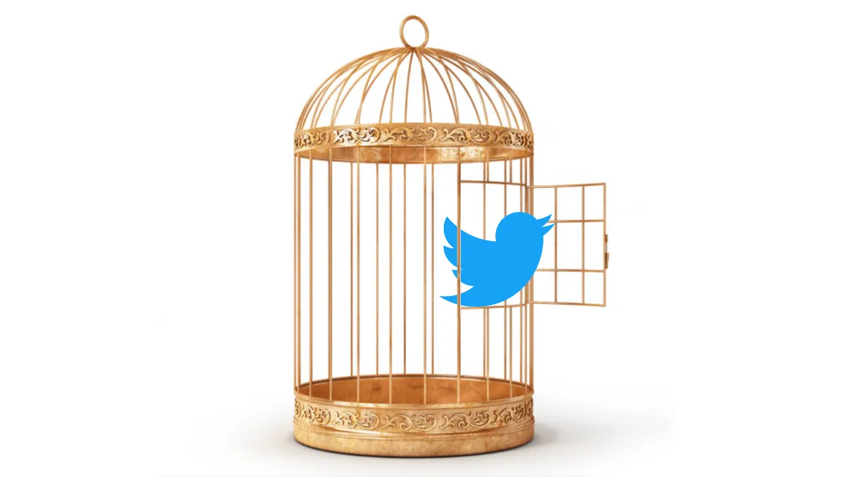 Twitter logo scaping from a cage