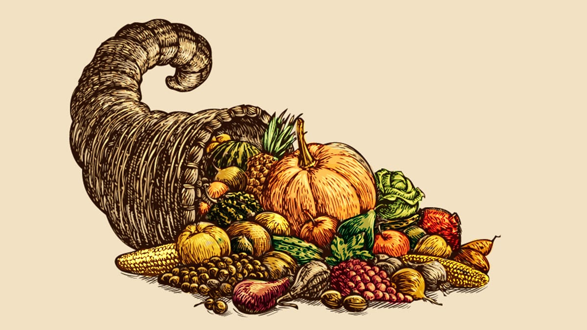 Cornucopia overflowing with fruits and vegetables.