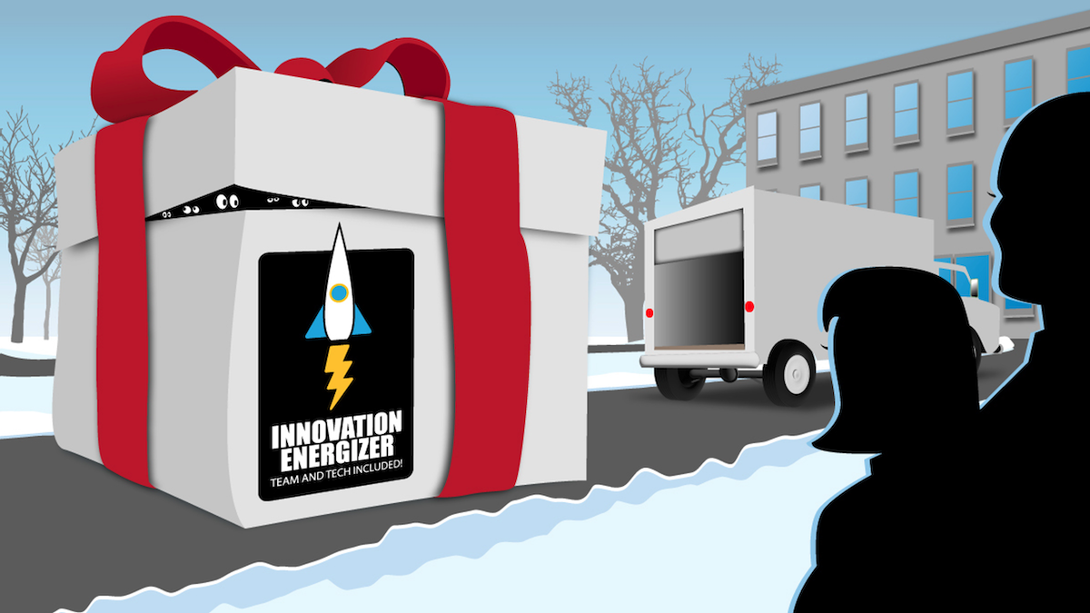 Gift box labeled ‘Innovation Energizer’ with a rocket logo, truck, and snowy background.